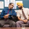 Ranbir Kapoor talking to a man | Rocket Singh: Salesman of the Year Photo Gallery