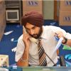 Ranbir Kapoor receiving a phone | Rocket Singh: Salesman of the Year Photo Gallery