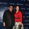 Simone Singh poses with Farhad Samar at the Launch of Jimmy Choo Eyewear Launch