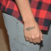 Varun Dhawan shows his tattoo at Special Screening of 'Beauty and the Beast'