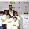 Virat Kohli poses with kids at a Charity Auction