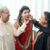 Sambhavana Seth poses with her mom and dad at Mehendi Ceremony!