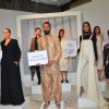 Pooja Hegde poses with the models at International Woolmark Prize, Mumbai event