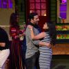 Akshay Kumar dances with a girl during Promotions of 'RUSTOM' at The Kapil Sharma Show