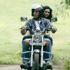Farhan Akhtar : Deepika and Farhan sitting on a bike