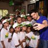 Sooraj poses for a selfie with the kids