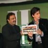 Shah Rukh Khan with Thumbey Moideen at the launch of a health magazine "Health International" in Mumbai on April8
