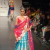 Mode walksl on the ramp of Anita Dongre''s timeless collection for spring/summer 2010 at Lakme Fashion Week was a stylish nostalgic fashion odyssey