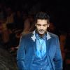 John Abraham on the ramp for Designer Rocky S at Lakme Fashion Week for spring/summer 2010