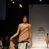 A model walks the runway at the Neha Aggarwal show at Lakme Fashion Week Spring/Summer 2010