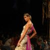 A model walks the runway at Rakesh Aggarwal show at the Lakme Fashion Week Spring/Summer 2010 Day 5, in Mumbai