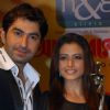 Tollywood actors Jeet and Koel unveiling of the new Trophy of Anandalok Purashkar 2009 at a function in Kolkata on 15th oct 09