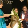 President Pratibha Devi Singh Patil presenting '''' 55th National film award to Shankar Mahadevan at Vigyan Bhawan, in New Delhi on Wednesday, also in photo I and B minister Ambika Soni