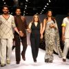 Star cast of film "Jail" Neil Nitin Mukesh and Manoj Bajpai with director Madhur Bhandarkar at the designer Reynu Tondon''s show at the Wills Lifestyle India Fashion Week