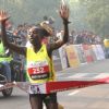 Kenya''s Mary Keitany won the women''s race in the Airtel Delhi Half Marathon , clocking a new record of 66 min:54 sec,in New Delhi on Sunday ( Photo: IANS)