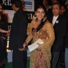 Bollywood actor Ajay Devgan with wife Kajol at the premiere of film "Paa"
