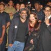 Bollywood actors Abhishek Bachchan with wife Aishwarya Rai Bachchan at the premiere of film "Paa"