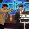 Cricketer Sourav Ganguly and Bollywood star Shahrukh Khan at the shooting of a TV program in Kolkata on Sunday