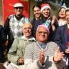 School children celebrating christmas with senior citizens at a old age home in a programme orginizied by help age India in New Delhi on Wednesday