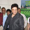 Bollywood Actor Govinda pose for the photographers during the press conference of Bhojpuri film "Nanihal" in Mumbai on Monday