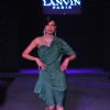 Model wearing collections of Lanvin, Stella McCartney and Moschino- the collections were launched by Priya Chatwal and Charu Sachdev in Mumbai