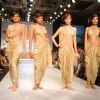 Model on the ramp at Rhea Nasta show at the India International Jewellery Week on Day 3