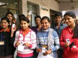 Young voters pledge to uphold the democratic traditions at a election centres in New Delhi