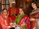 Pratibha Patil receiving the first copy of the book ''Colours of My Rainbow'' from Salma Ansari at Rashtrapati Bhavan