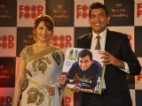 Sanjeev Kapoor with Madhuri Dixit during the announcement of 'Amul FoodFood Mahachallenge' Reality Show in Mumbai