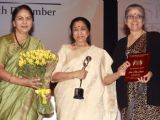 The poster release of Asha Bhosle's film "Mai" on "Happy Woman's Day" celebration at Balayogi Auditorium at Parliament House in New Delhi