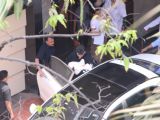 Karan Johar taking his babies home from hospital