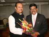 Subodh Kant Sahai with Karnatakas Minister for Large and Medium Scale Industries, Murgesh Nirani at a meeting in New Delhi