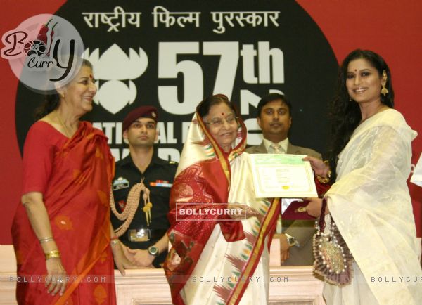President Pratibha Patil presenting the  the Best Actress award to Ananya Chatterjee  for film