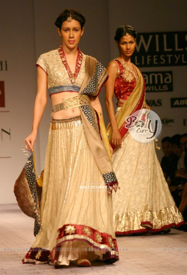 Models showcasing  designer Anju Modi's  creations at the Wills Lifestyle India Fashion Week-Spring summer 2011,in New Delhi on Sunday