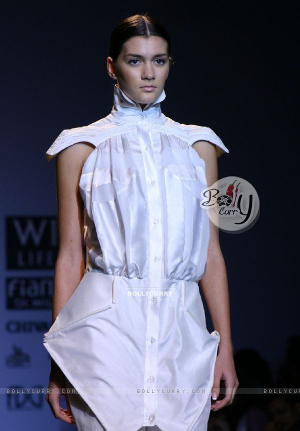 A model showcasing a designer Arjun's creation at the Wills Lifestyle India Fashion Week-Spring summer 2011, in New Delhi on Monday