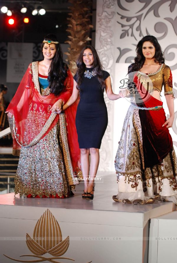 Geeta Basra and Zarine Khan with fashion designer Sonia Mehra walk on ramp at Aamby Valley Indian Br