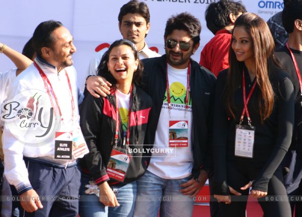 Bollywood actors Rahul Bose, Arshad Warsi and Bipasha Basu during the Delhi Half Marathon, in New Delhi