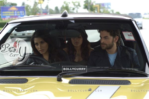 Neil,Bipasha and Sophie sitting on a taxi