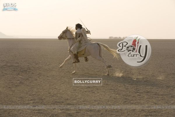 Abhishek Bachchan sitting on a horse