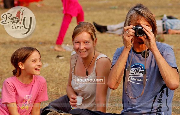 Foreigners capture the moment while tourists enjoy first day of New Year 2011 in Kolkata Maidan on Saturday. .