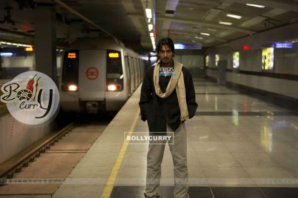 Anurag Sinha standing in a metro station (11598)