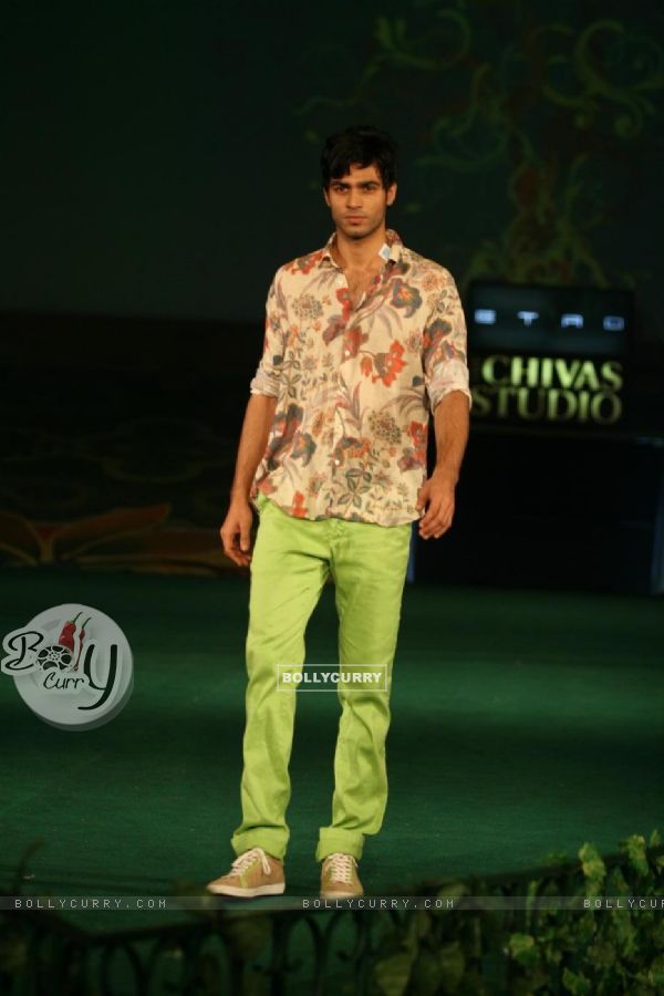 Models walking on the ramp for Chivas Studio Fashion Show at Mahalaxmi Race Course
