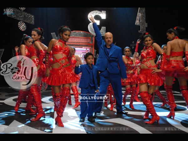Anupam Kher dancing with a small boy