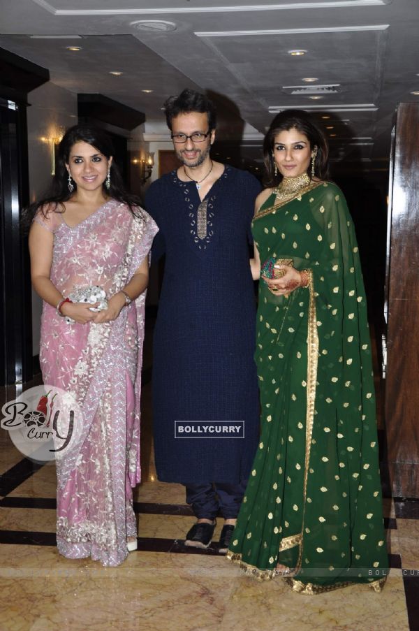 Raveena Tandon with her husband in Sameer Soni and Neelam's wedding reception at Taj Land's End