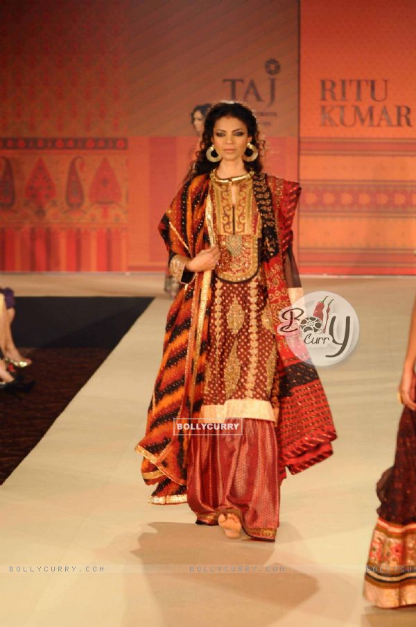 Models walking on the ramp for Ritu Kumar fashion show at Taj land's End. .