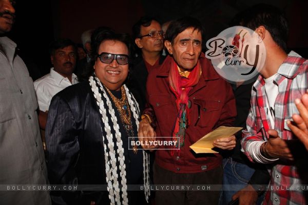 Bappi Lahiri at Dev Anands old classic film Hum Dono premiere at Cinemax Versova