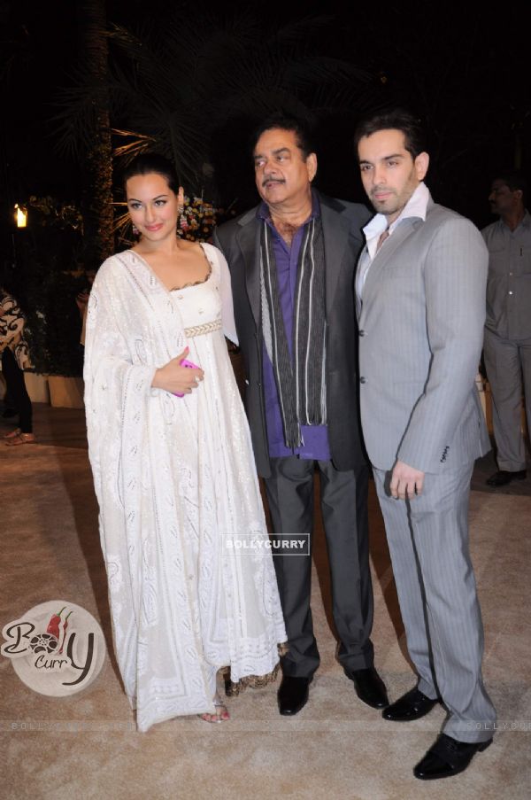 Sonakshi Sinha with father Shatrughan Sinha at Imran Khan and Avantika Malik's Wedding Reception Party at Taj Land's End. .