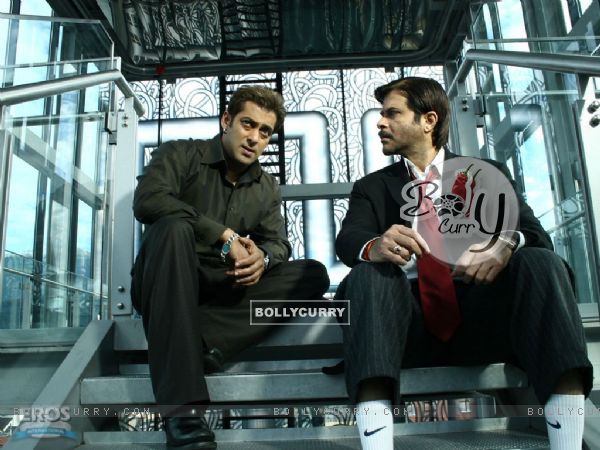 Anil Kapoor and Salman Khan sitting on the staircase