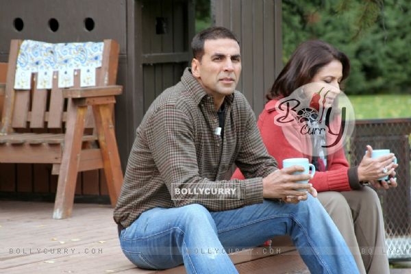 Akshay having a cup of coffee with Sharmila Tagore
