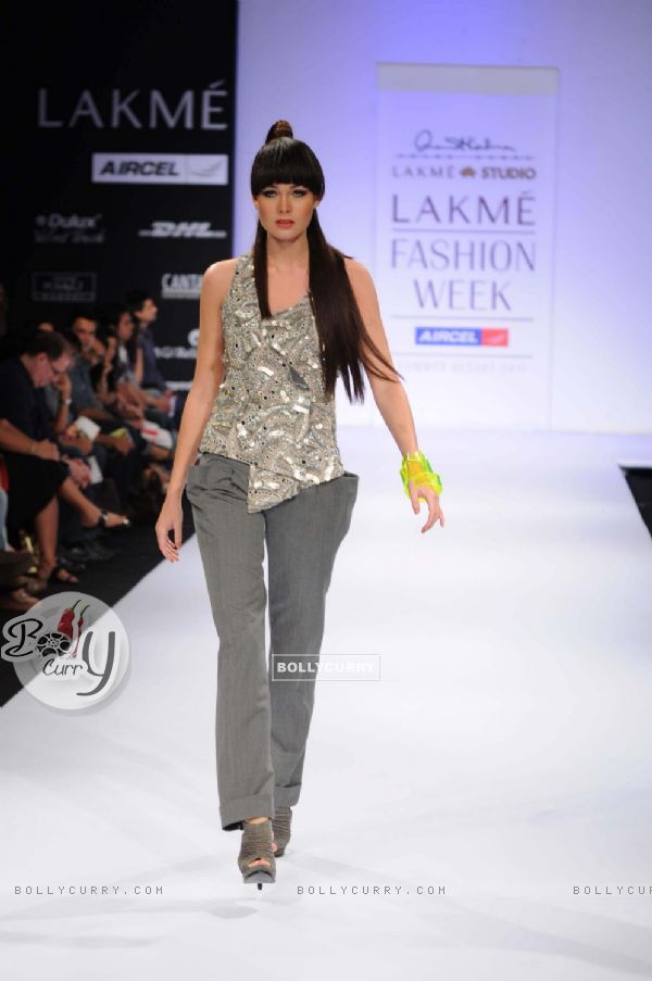 A model displays designer Anand Kabra's creations during the Lakme Fashion Week day 2 in Mumbai. .